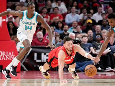 Ball has 34 points and 11 assists in return from ankle injury to lead Hornets over Rockets 110-105