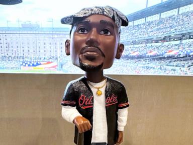 Orioles hold Tupac Skakur bobblehead promotion, and his sister throws out the ceremonial first pitch