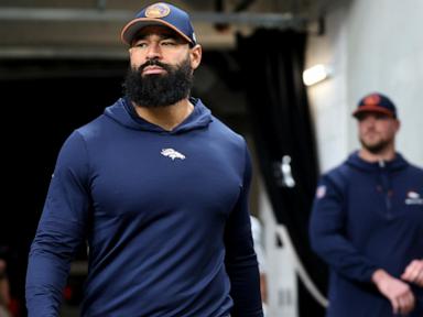 Broncos assistant coach Michael Wilhoite arrested after being accused of punching a police officer