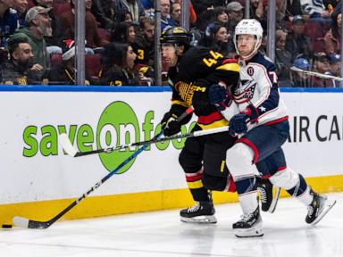 Suter scores 2 as Canucks rally to beat Blue Jackets 5-2