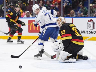 Brayden Point's 4-point night leads the Lightning over the Canucks 4-2