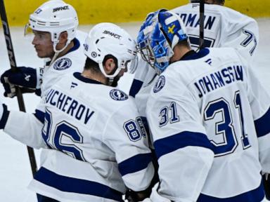 Kucherov scores in OT to give Lightning 4-3 win over Blackhawks