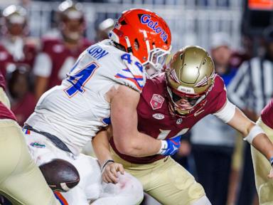 College football players scuffle after flags come out following rivalry wins