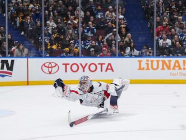 Canucks hold Ovechkin in check, beat Washington 2-1 to end Capitals' winning streak at 6