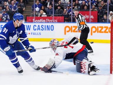 McMichael helps the Capitals beat the Maple Leafs 3-1 for franchise-record 8th straight road win