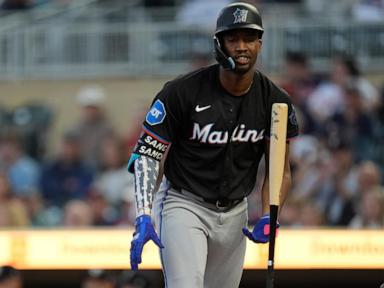 Marlins push Twins to brink of elimination with 8-6 win in 13 innings