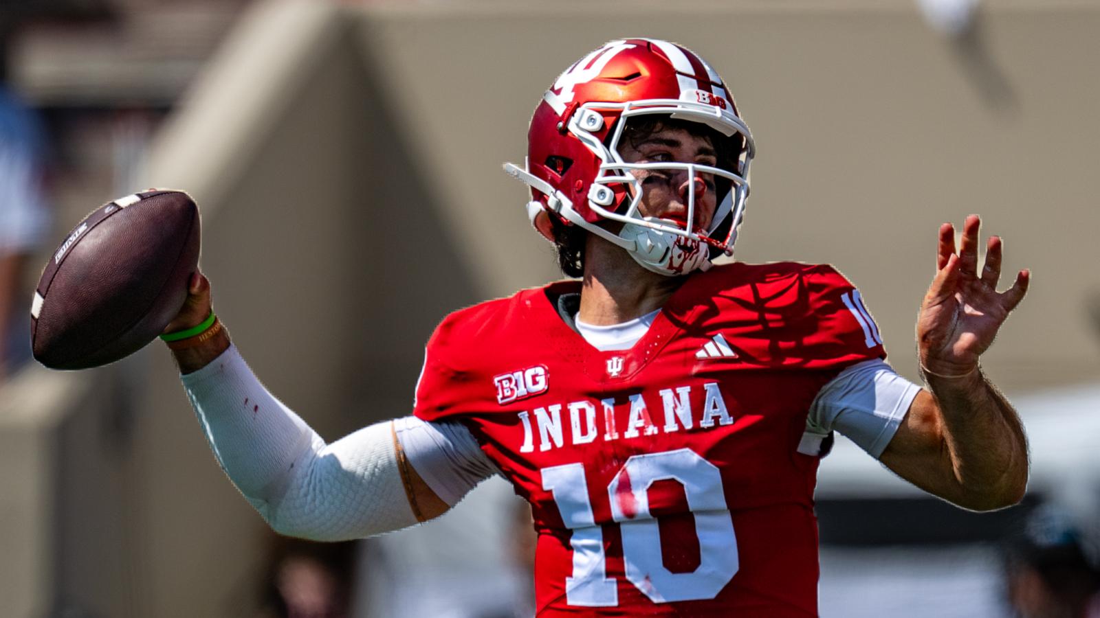Josh Hoover throws 4 TD passes as No. 6 Indiana opens title defense with a 52-16 rout of North Texas