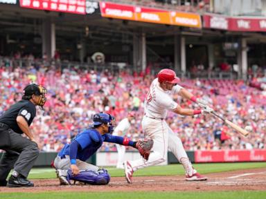 Santiago Espinal homers to extend hit streak to 10 games, Reds' bullpen holds on to beat Cubs 6-3