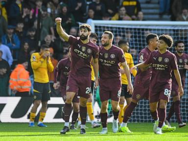 Stones scores injury-time winner as Man City beats struggling Wolves 2-1 in Premier League