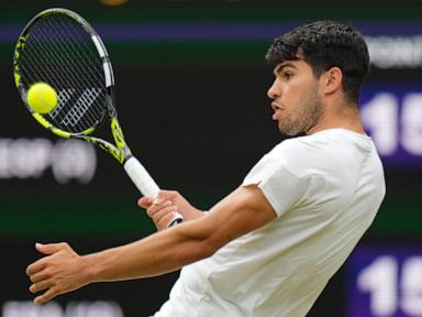 Alcaraz holds off Humbert in 4 sets to reach Wimbledon quarterfinals