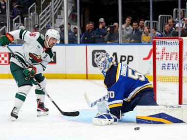 Goalie Gustavsson makes 27 saves, scores an empty-netter, Wild beat Blues 4-1