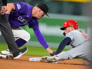 Winn homers, drives in 4 runs as Cardinals top Rockies 7-3