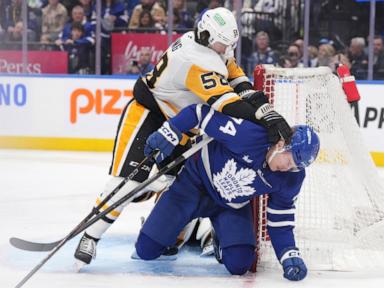 Marner helps Toronto beat the Pittsburgh Penguins 4-2 in the Maple Leafs' home opener