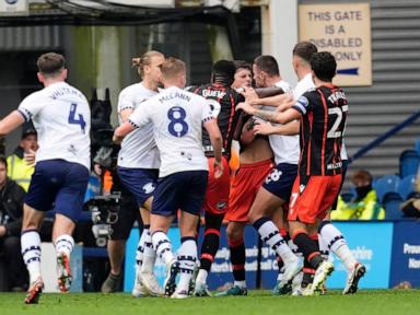 Soccer player in England's second division suspended for biting opponent during ill-tempered game