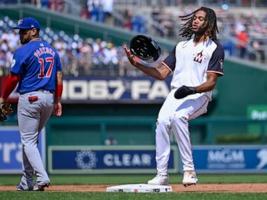 Dansby Swanson gets 4 hits as the surging Chicago Cubs beat the Washington Nationals 14-1