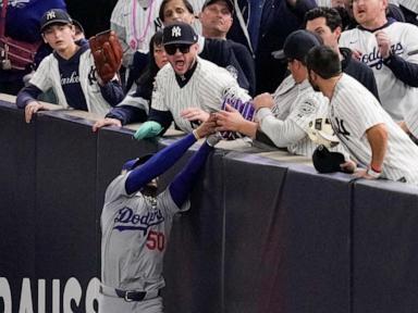 Yankee Stadium fan ejected for prying ball out of Mookie Betts' glove at World Series