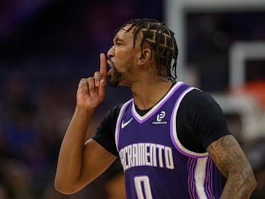 Malik Monk's late scoring flurry helps the Kings hold off Nets 126-122
