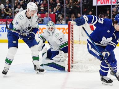 Lankinen makes 20 saves and Canucks end skid with 3-0 win over Maple Leafs