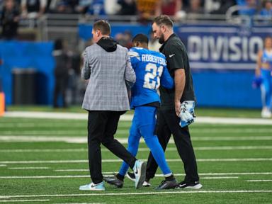 Lions CB Amik Robertson hurt and QB Jared Goff misses a series in playoff game vs. Commanders