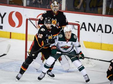 Andersson scores shootout winner, and the Flames hold off a late Wild comeback in 4-3 win