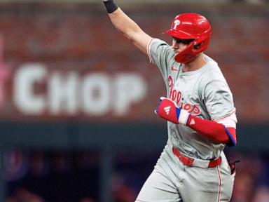 Trea Turner homers twice, Aaron Nola gets 100th career win in Phillies' 8-6 victory over Braves