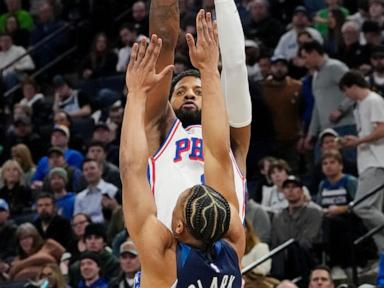 Reid scores 23 as Wolves pull away in fourth to beat 76ers 126-112