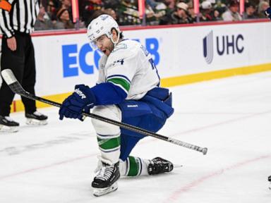 Kaprizov scores late in OT and NHL-leading Wild rally for 3-2 win over Canucks