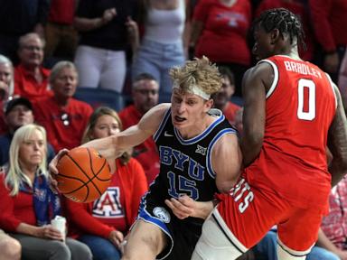 Saunders scores 23 including 2 critical free throws and BYU beats No. 19 Arizona 96-95