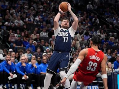 Mavs star Luka Doncic will be out about a month before check on calf injury, AP source says