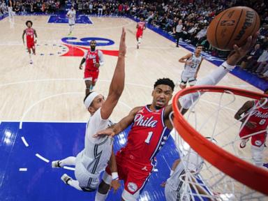 Paul George has 21 points and 9 assists in the 76ers' 102-94 victory over the Magic