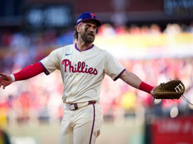 Mets use another October rally to score 5 runs in 8th and top Phillies 6-2 in Game 1 of NLDS