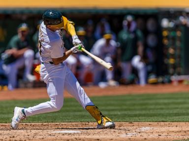 Rooker, Schuemann hit 3-run homers in Athletics' 19-8 rout of Orioles