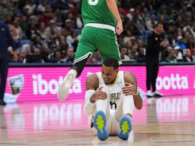 Pelicans' Dejounte Murray suffers lower right leg injury vs. Celtics