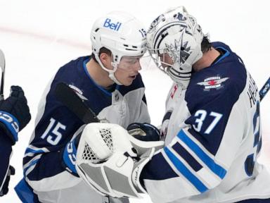 Lowry scores late goal to help Winnipeg Jets top San Jose Sharks 4-3