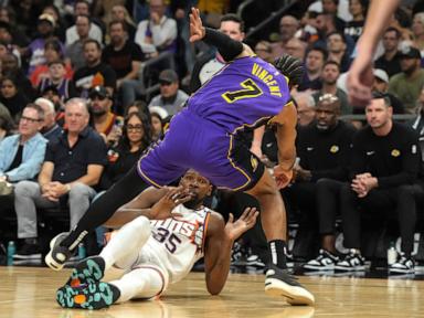 Booker scores 33, Durant adds 30 as the Suns rally for 109-105 win and hand Lakers first loss