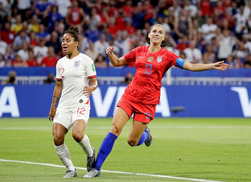 PHOTO: US' Alex Morgan, right, celebrates after scoring her second goal next to England's Demi Stokes during the Women's World Cup semifinal soccer match between England and the United States at the Stade de Lyon in Lyon, France, July 2, 2019.