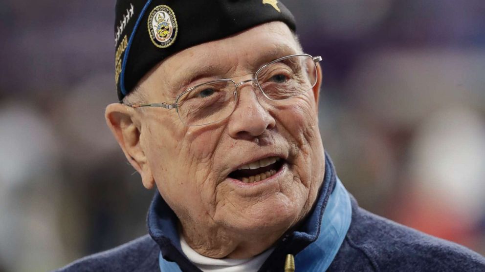 PHOTO: Woody Williams, 94, the only living Marine Medal of Honor recipient from World War II, assists with the coin toss of the NFL Super Bowl 52 football game between the Philadelphia Eagles and the New England Patriots, Feb. 4, 2018, in Minneapolis. 