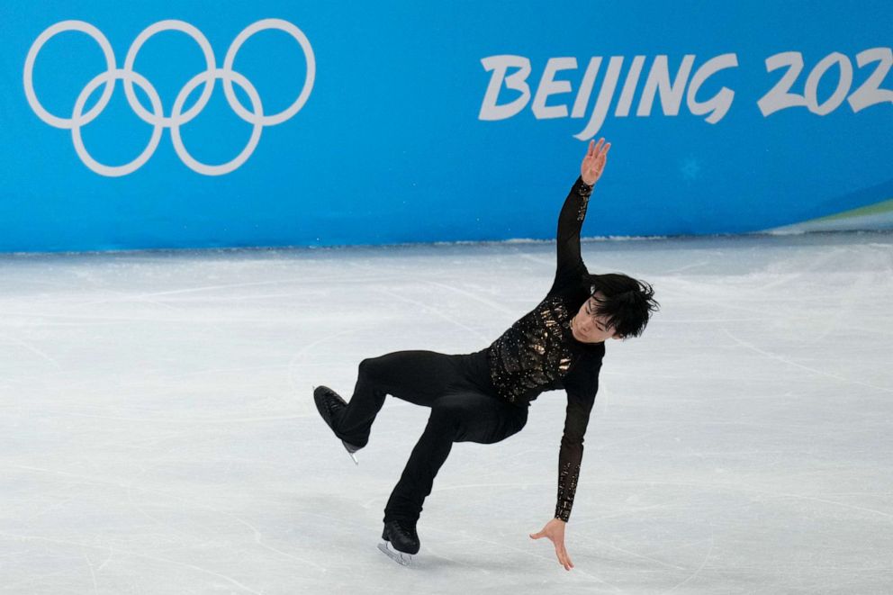 PHOTO: Yuma Kagiyama, of Japan, competes in the men's free skate program during the figure skating event at the 2022 Winter Olympics, Thursday, Feb. 10, 2022, in Beijing.