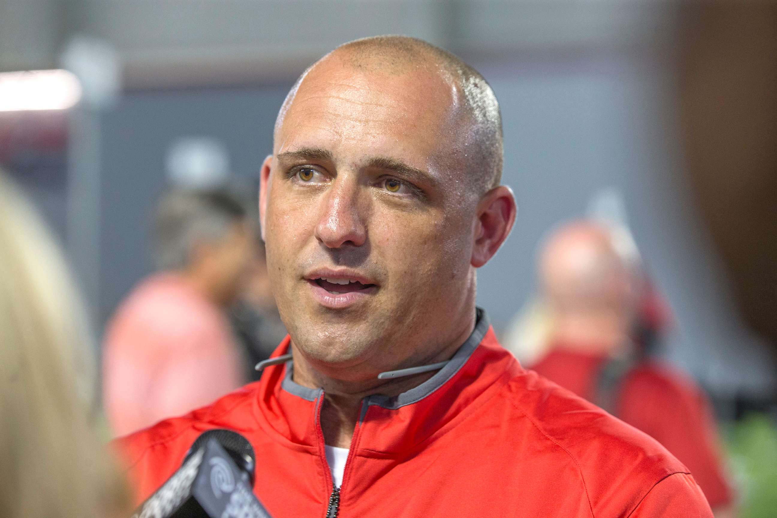 PHOTO: Coach Zach Smith talking to the media during the Ohio State Football Media Day at the Woody Hayes Athletic Center in Columbus, Ohio, Aug. 16, 2015.