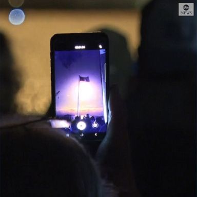 Spectators cheered across from a launch pad as SpaceX's Falcon rocket launched into orbit from Florida's Kennedy Space Center.