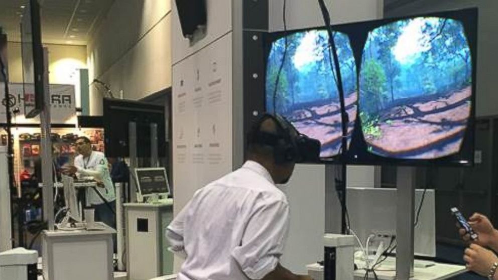 PHOTO: A gamer is shown using the Oculus Rift headset at E3.