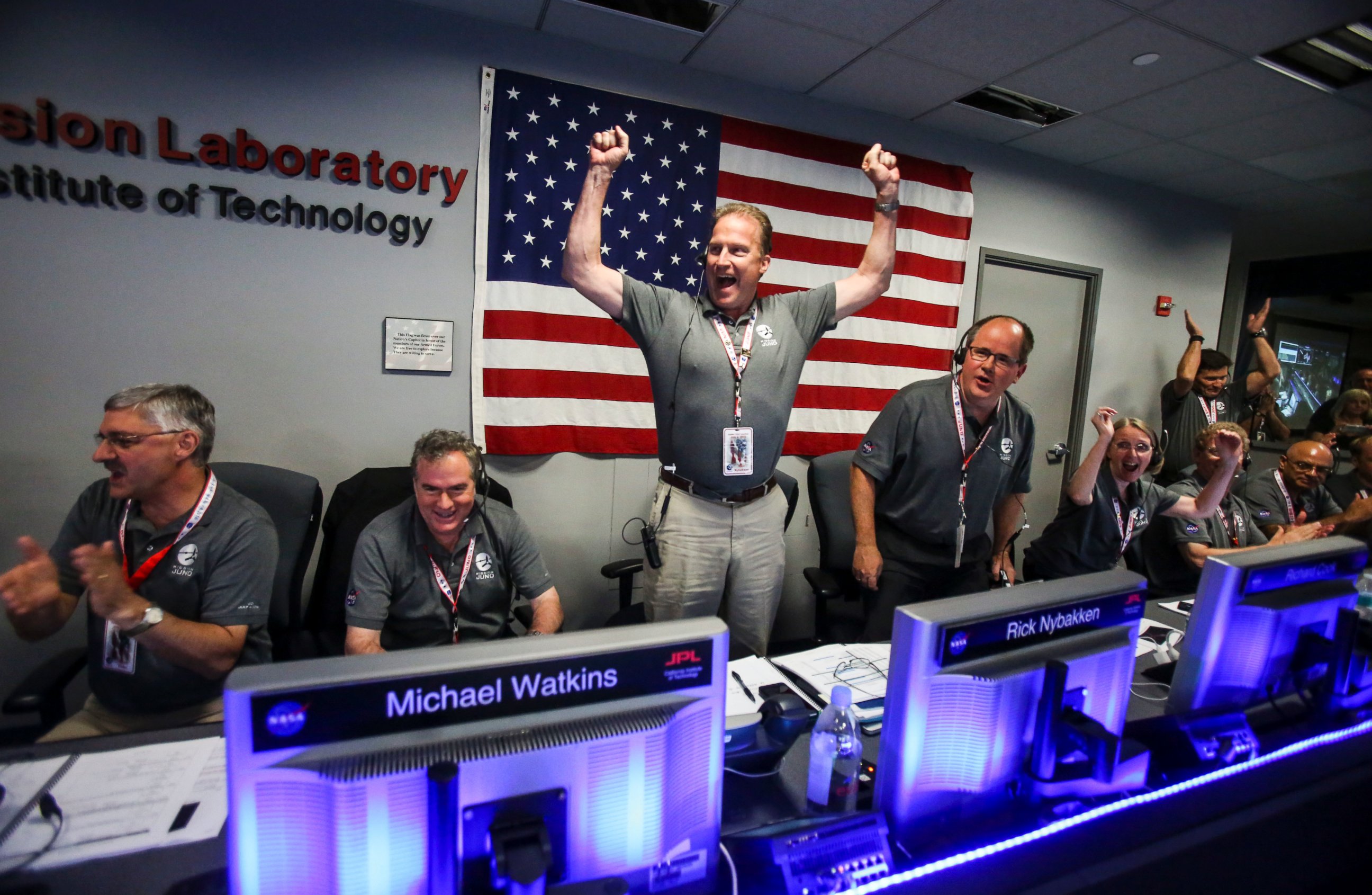 PHOTO: From left to right, Geoffrey Yoder, Michael Watkins, Rick Nybakken, Richard Cook and Jan Chodas celebrate in Mission Control at NASA's Jet Propulsion Laboratory as Juno goes into orbit around Jupiter on July 4, 2016, in Pasadena, California.