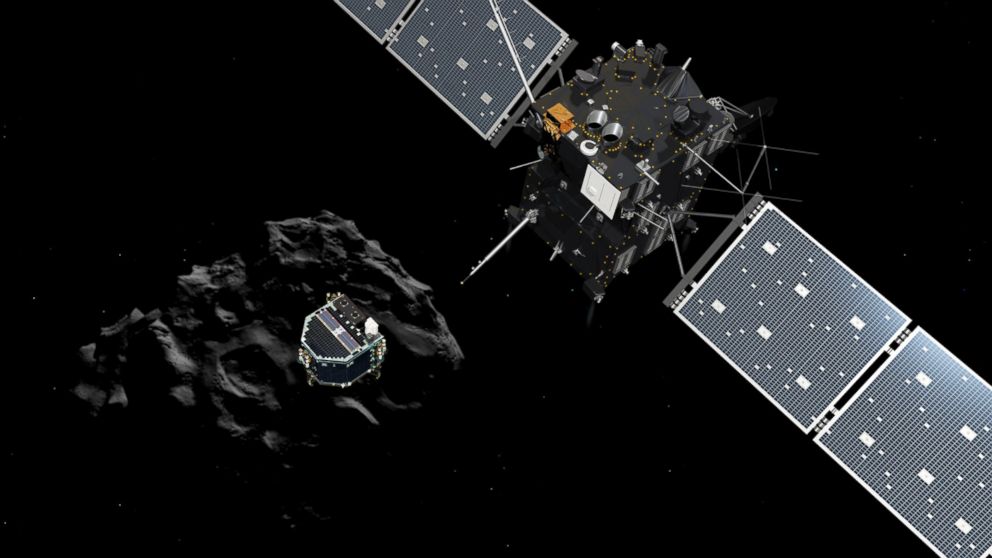 The image released by the European Space Agency ESA, Nov. 12, 2014 shows an artist rendering by the ATG medialab depicting lander Philae separating from Rosetta mother spaceship and descending to the surface of comet 67P/Churyumov-Gerasimenko.