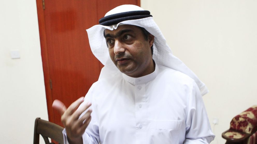 Human rights activist Ahmed Mansoor speaks to Associated Press journalists in Ajman, United Arab Emirates, Aug. 25, 2016.