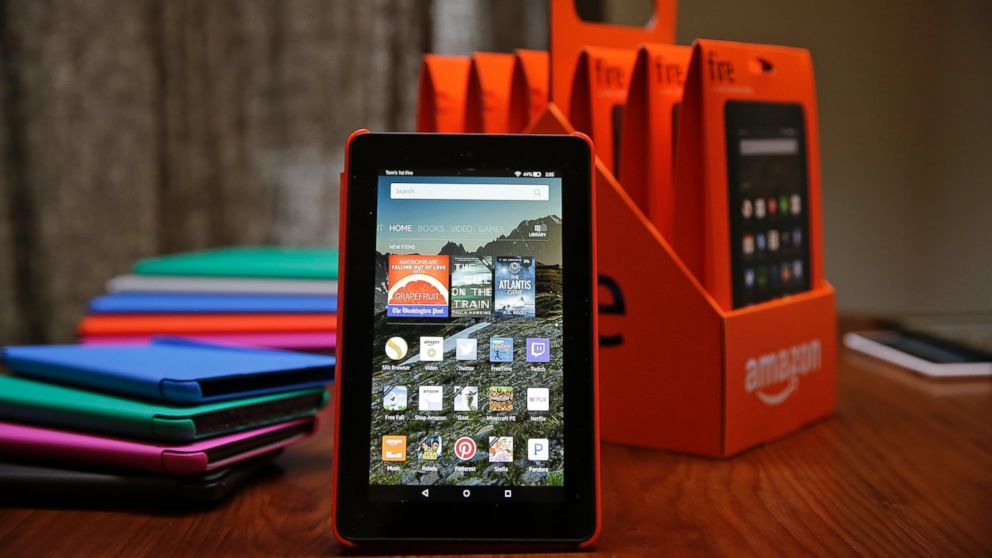 PHOTO: Amazon's new $50 Fire tablet is displayed next to a six-pack of them and assorted colored cases in San Francisco on Sept. 16, 2015.