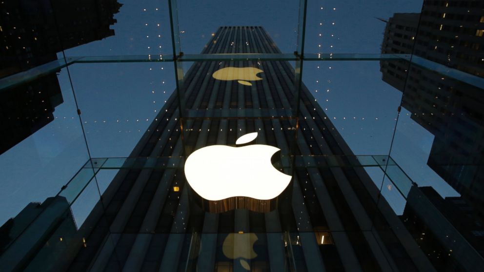 PHOTO: The Apple logo is illuminated in the entrance to the Fifth Avenue Apple store, in New York, Nov. 20, 2013.