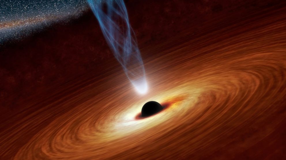 This illustration, released by NASA on Feb. 21, 2013, shows a supermassive black hole in the nearby spiral galaxy NGC 1365. 