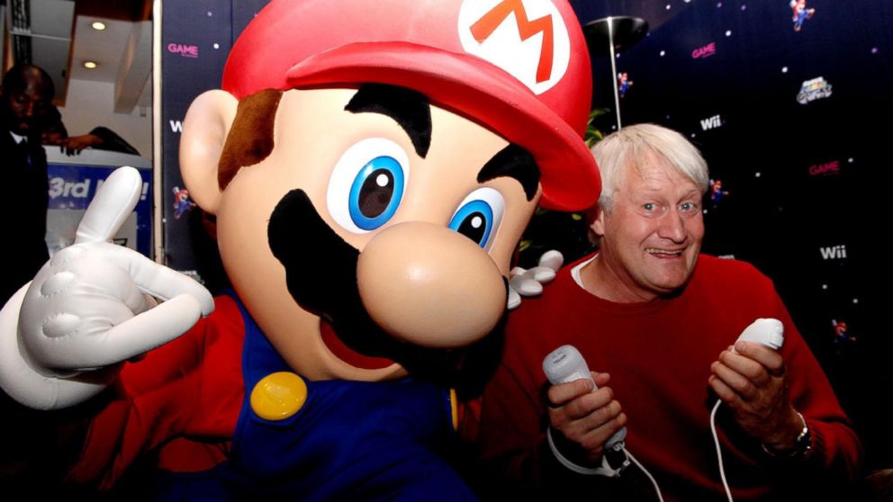 The voice of Super Mario, Charles Martinet, poses with Mario, Nov. 15, 2007, in London.