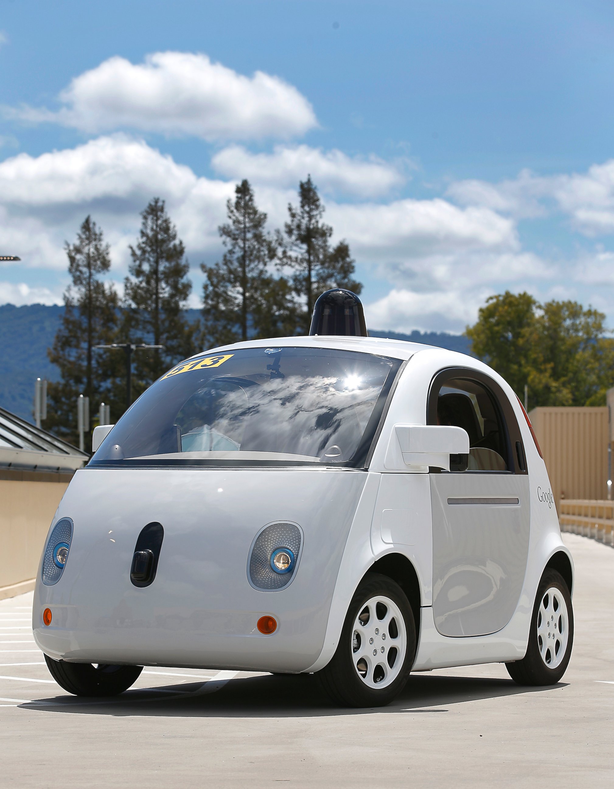 PHOTO: Google's new self-driving prototype car drives around a parking lot during a demonstration at Google campus in Mountain View, Calif, May 13, 2015. 