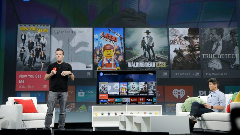 Dave Burke, left, director of engineering at Android, speaks about Android TV during the Google I/O 2014 keynote presentation in San Francisco, Calif., June 25, 2014. 